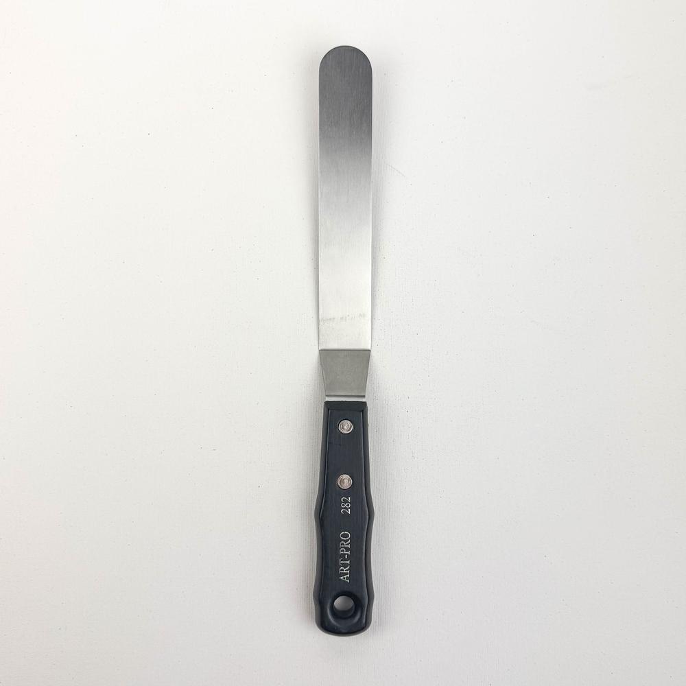 Spatule avec coude